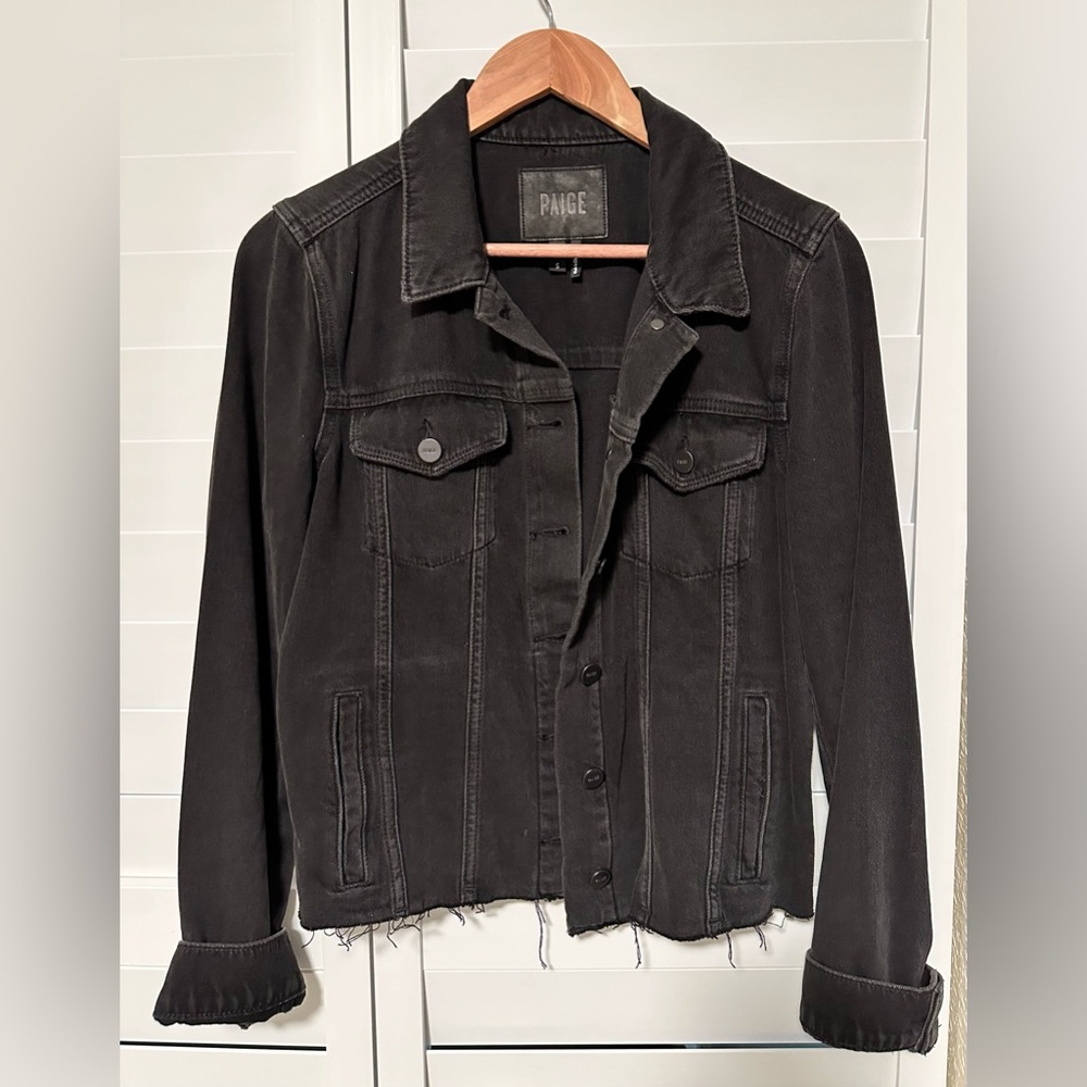 Paige black jean jacket. Faded black with frayed bottom.